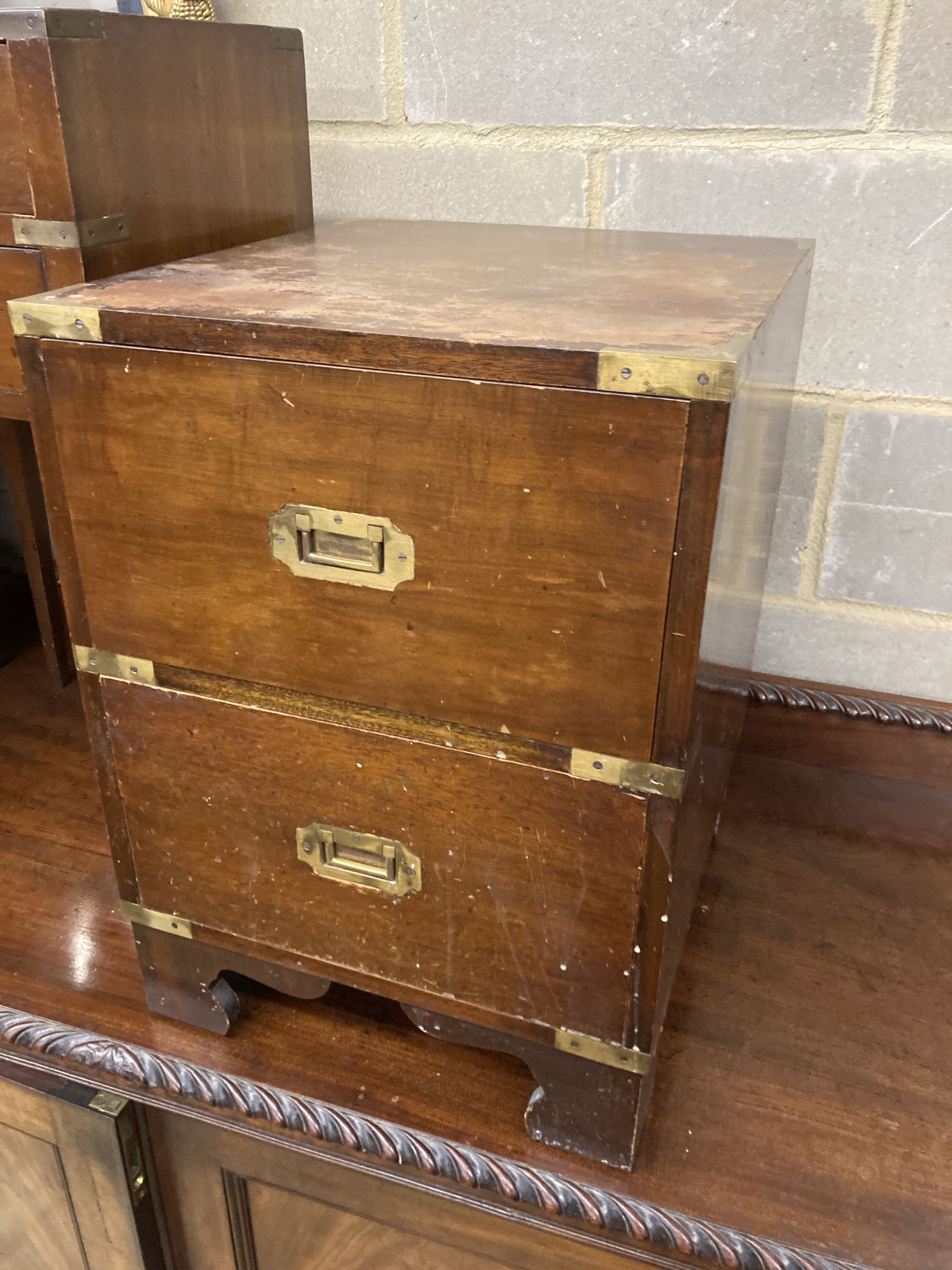 Three military style mahogany two drawer bedside chests, larger width 40cm, depth 46cm, height 56cm